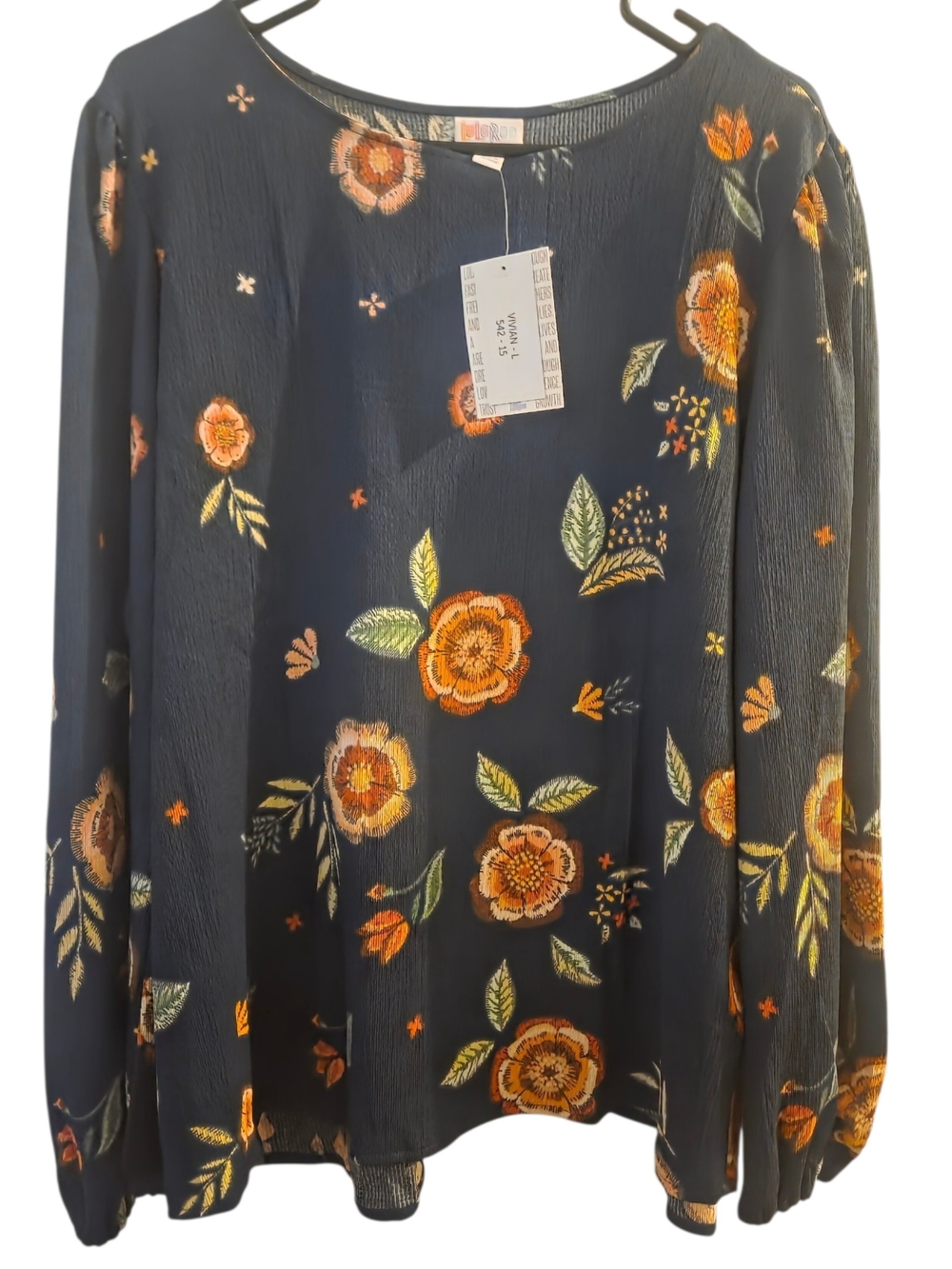 LuLaRoe Navy Floral Long Sleeve Top with Orange and Green Print